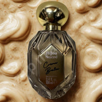 Thumbnail for Perfume bottle labeled 'Bijou Sucré' on a textured beige background