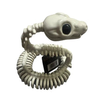 Thumbnail for Side angle view of coiled bone skeleton snake prop