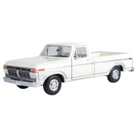 Thumbnail for Front three-quarter angle of white 1977 Ford F-150 diecast model car.