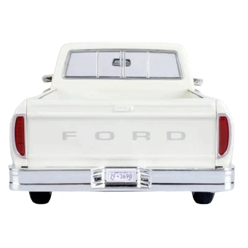 Rear view of 1977 Ford F-150 diecast truck showing FORD tailgate branding.