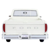 Thumbnail for Rear view of 1977 Ford F-150 diecast truck showing FORD tailgate branding.