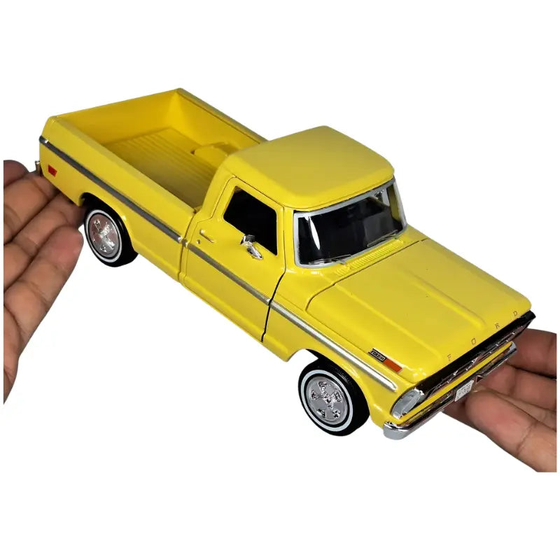 Direct rear view of the 1992 Ford F-150 Dually diecast truck showing taillight and bumper details.