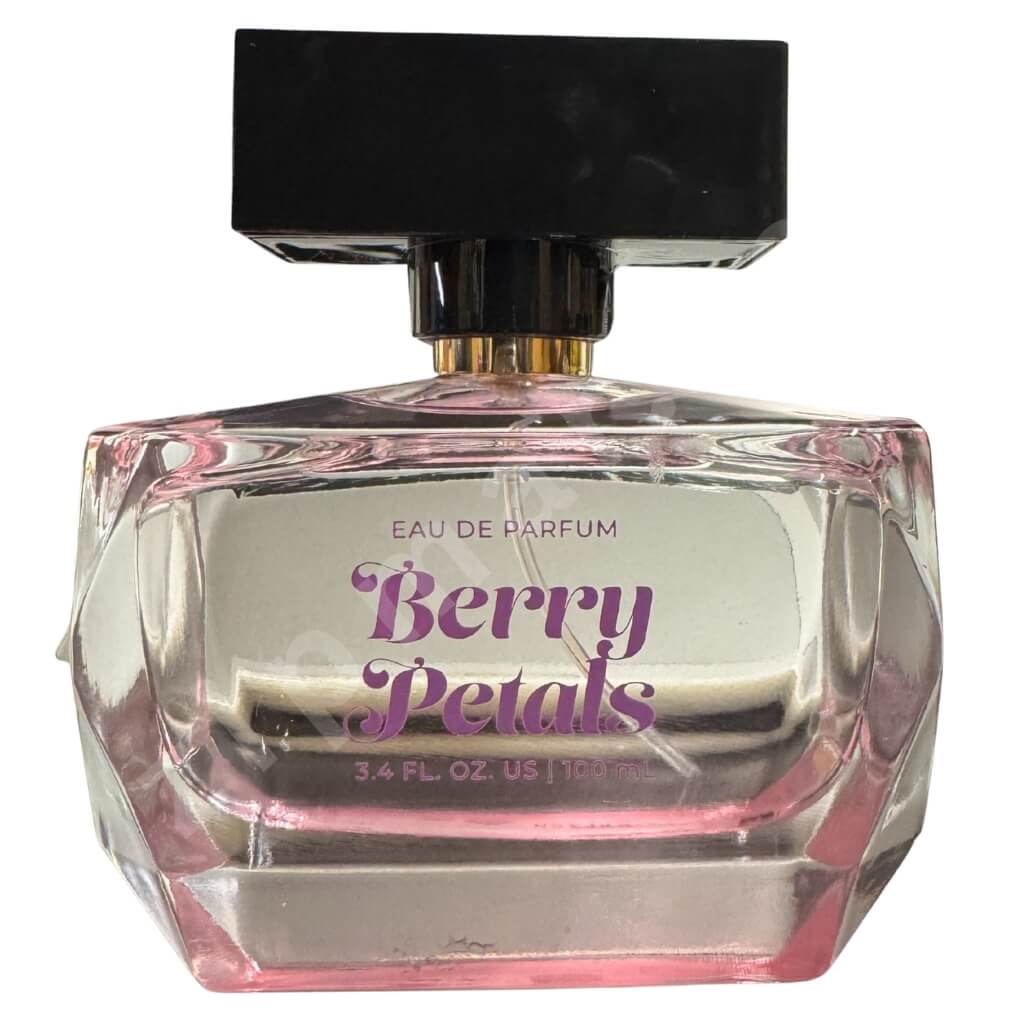 Perfume bottle labeled 'Berry Petals' on a white background