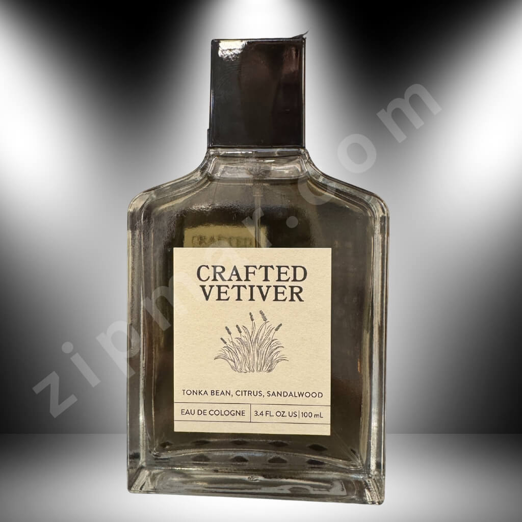 Perfume bottle labeled 'Crafted Vetiver' on a gradient background
