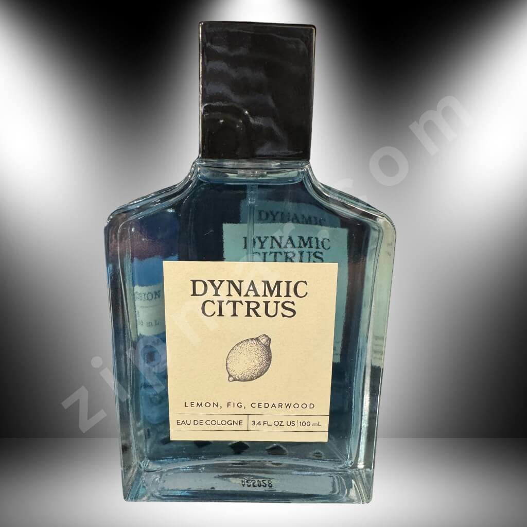 Bottle of Dynamic Citrus cologne with a gradient gray background