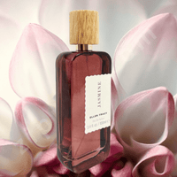 Thumbnail for Perfume bottle with wooden cap on pink floral background