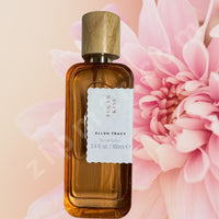 Thumbnail for Perfume bottle labeled 'Sugar Kiss' by Ellen Tracy with a pink flower in the background