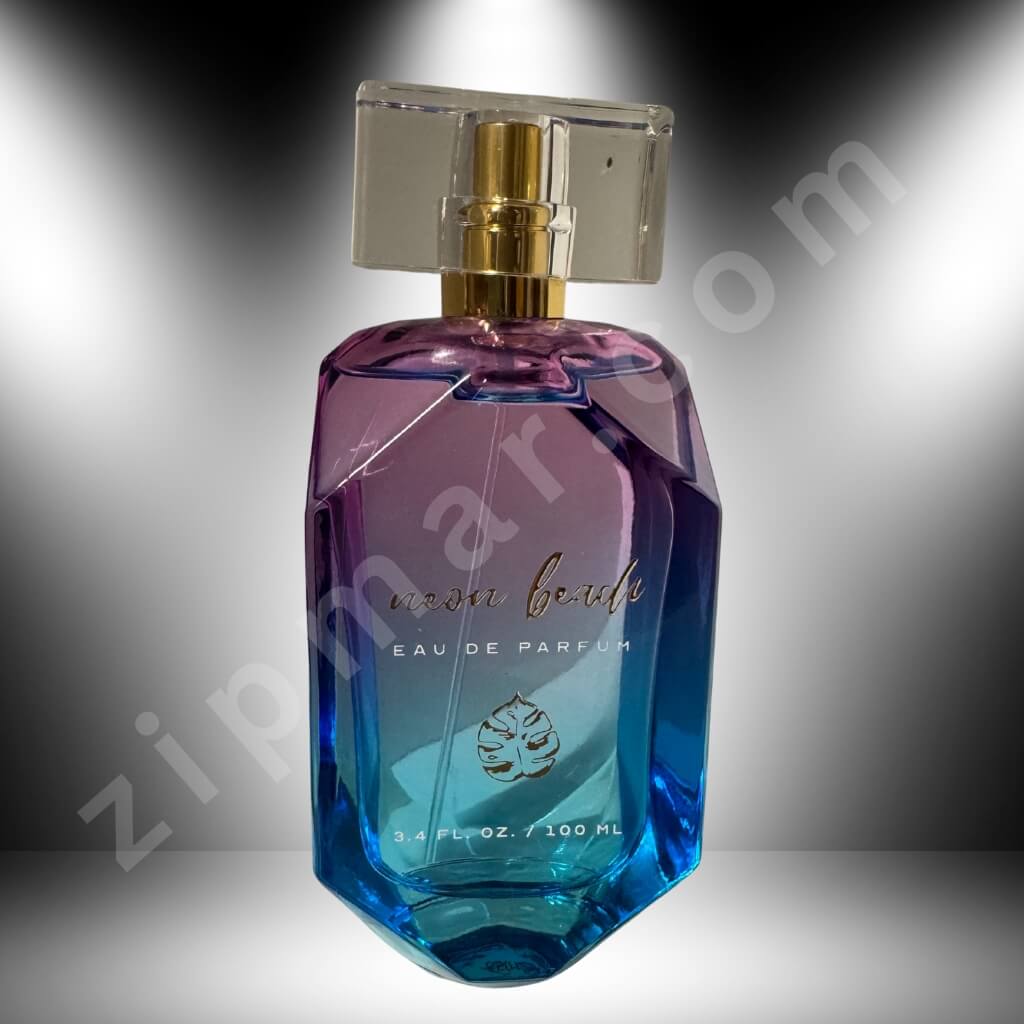 Perfume bottle with gradient design on a gray background