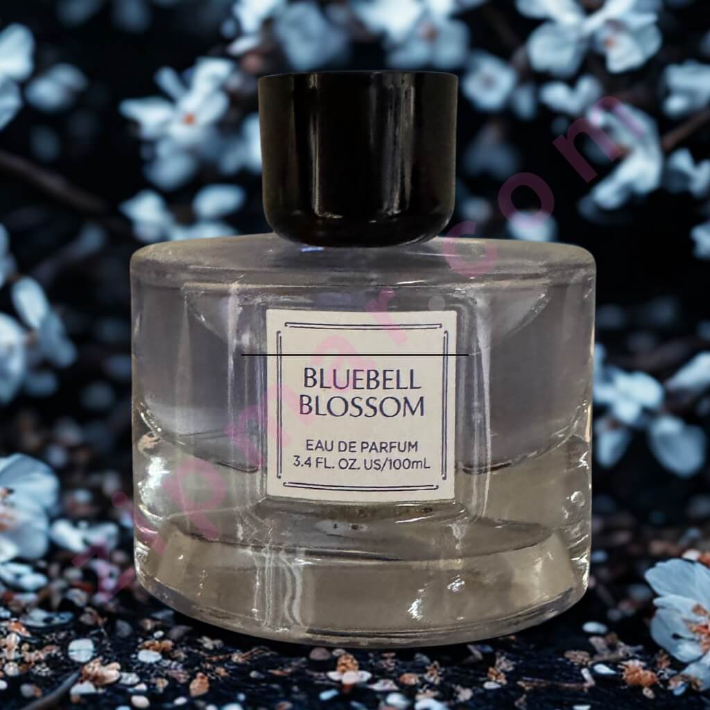 Perfume bottle labeled 'Bluebell Blossom' with a floral background