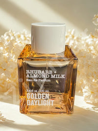 Thumbnail for “Rhubarb + Almond Milk perfume 3.4oz amber square bottle with white cap