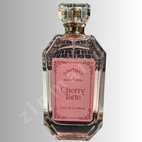 Thumbnail for Perfume bottle labeled 'Cherry Tarte' on a gray background