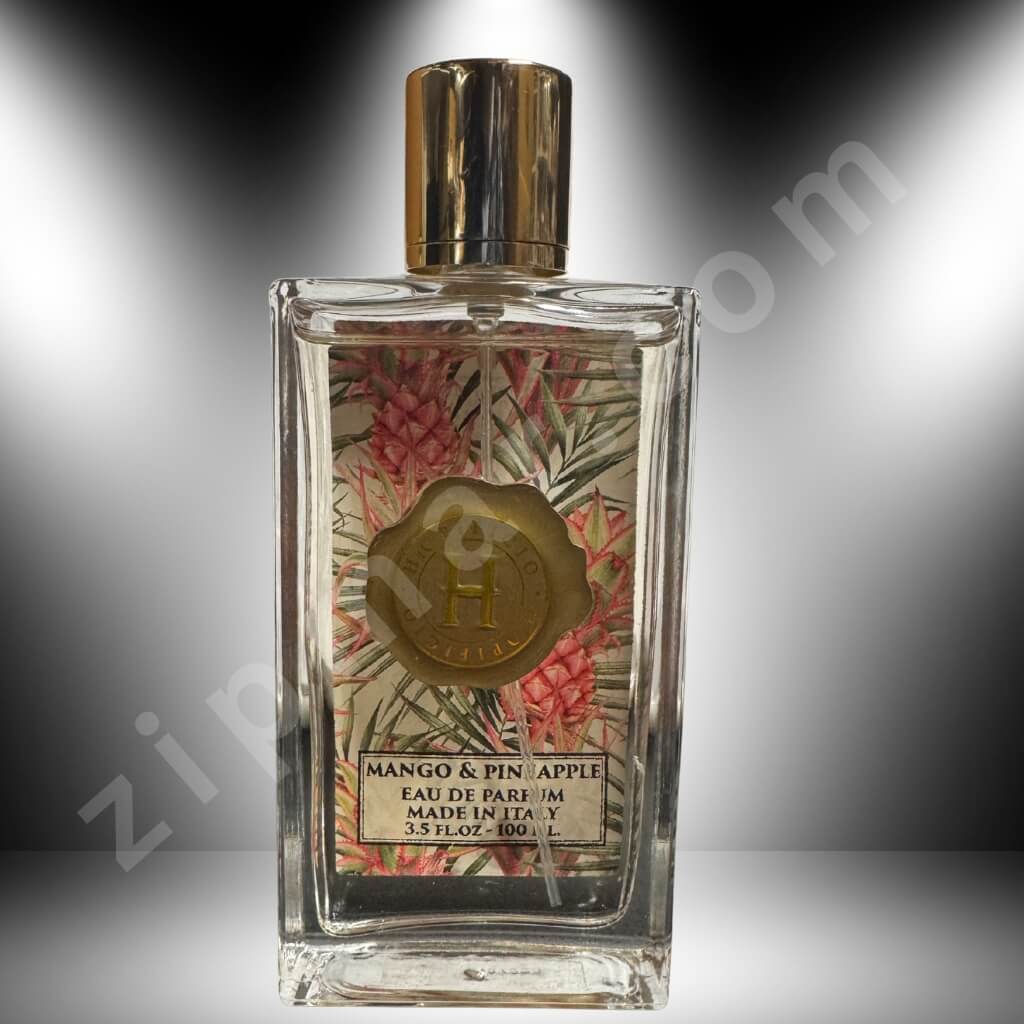 Perfume bottle with decorative label on a gray background