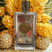 Thumbnail for Perfume bottle with floral design surrounded by yellow flowers and pineapples