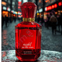 Thumbnail for Red perfume bottle labeled 'Night on the Town' with a blurred city street background