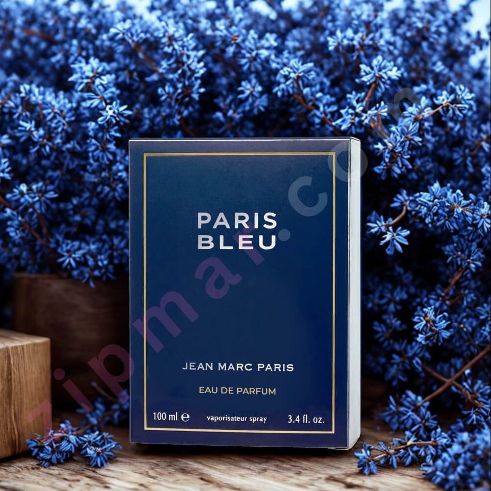 Perfume bottle labeled 'Paris Bleu' by Jean Marc Paris against a blue floral background