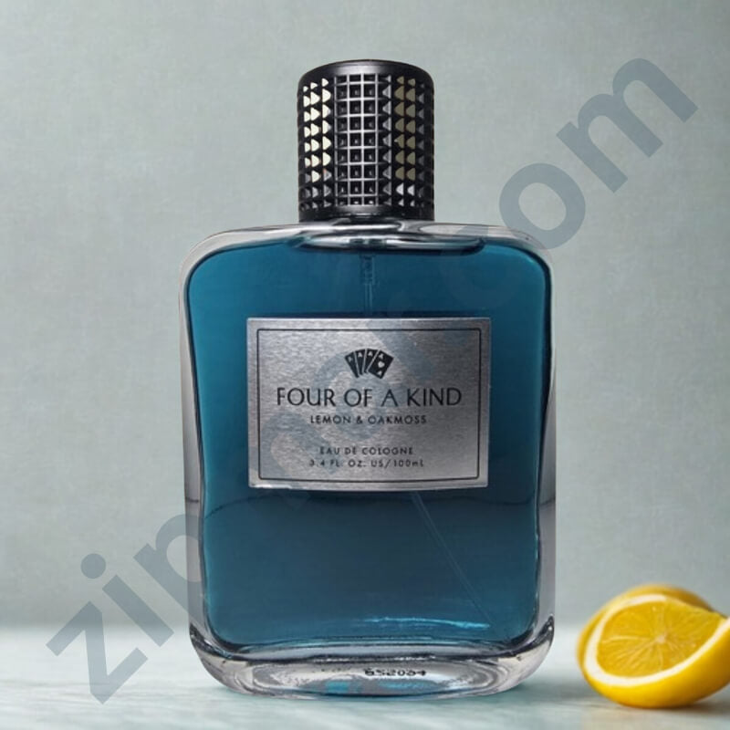 Blue perfume bottle labeled 'Four of a Kind' with a lemon on a light gray background