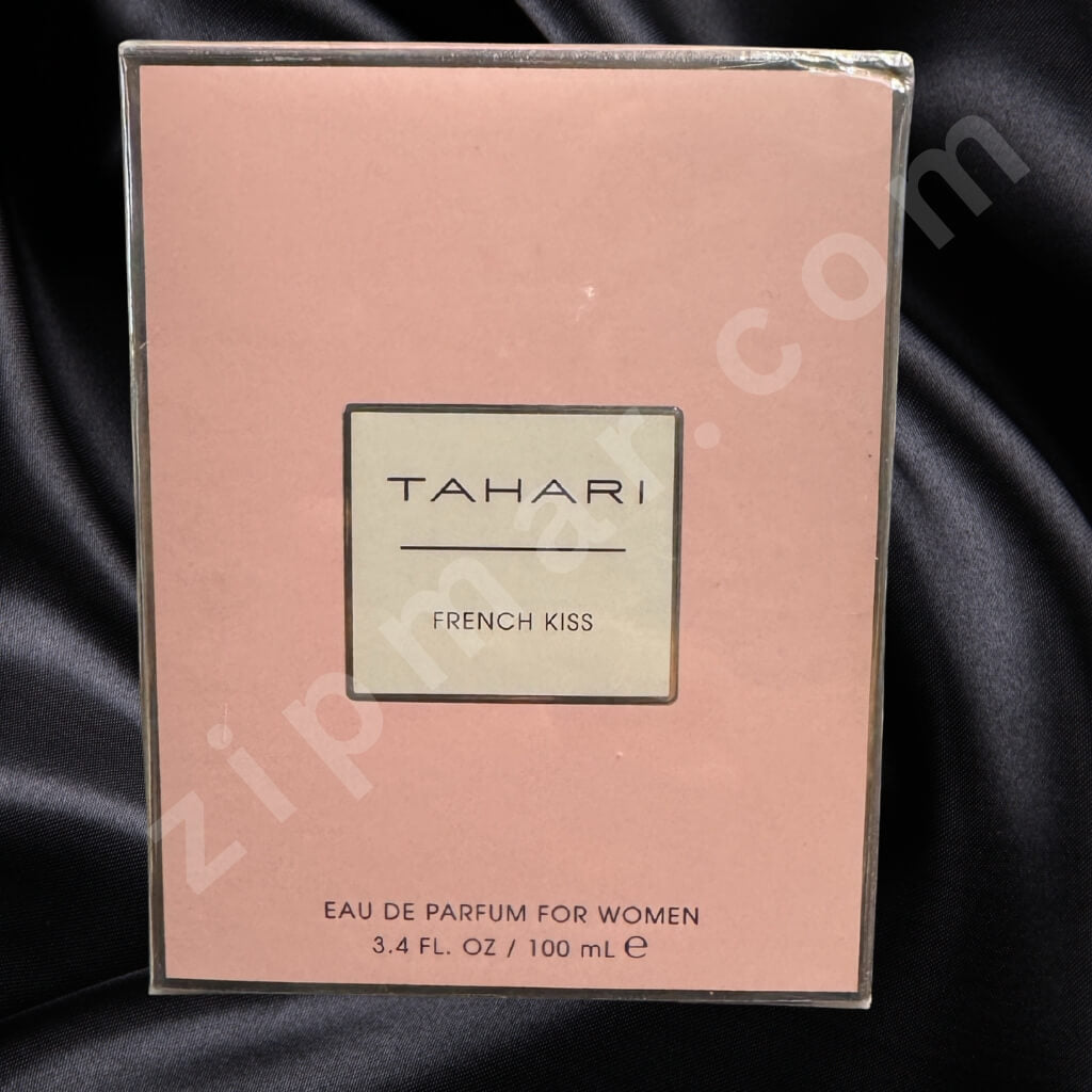 Tahari French Kiss perfume packaging on a black satin background