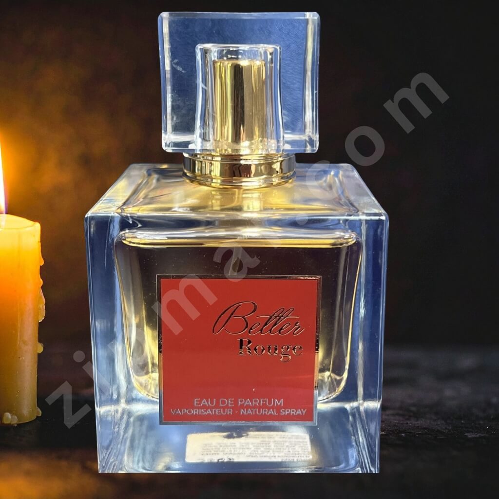 Perfume bottle labeled 'Belle Rouge' with a candle in the background