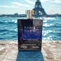 Thumbnail for Perfume bottle labeled 'Paris Bleu Platinum' by Jean Marc Paris with the Eiffel Tower in the background.