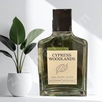 Thumbnail for Bottle of Cypress Woodlands cologne with a plant in the background