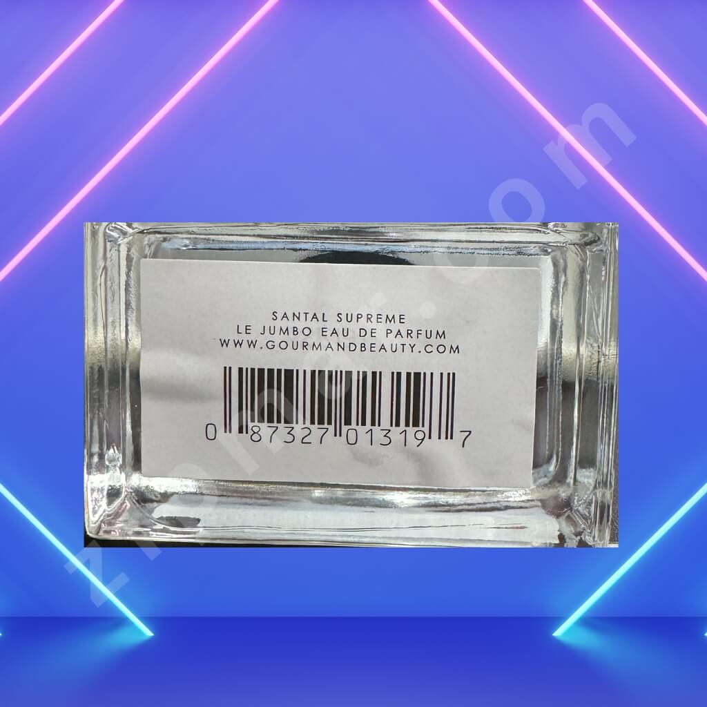 Back label of a perfume bottle with a barcode on a blue background