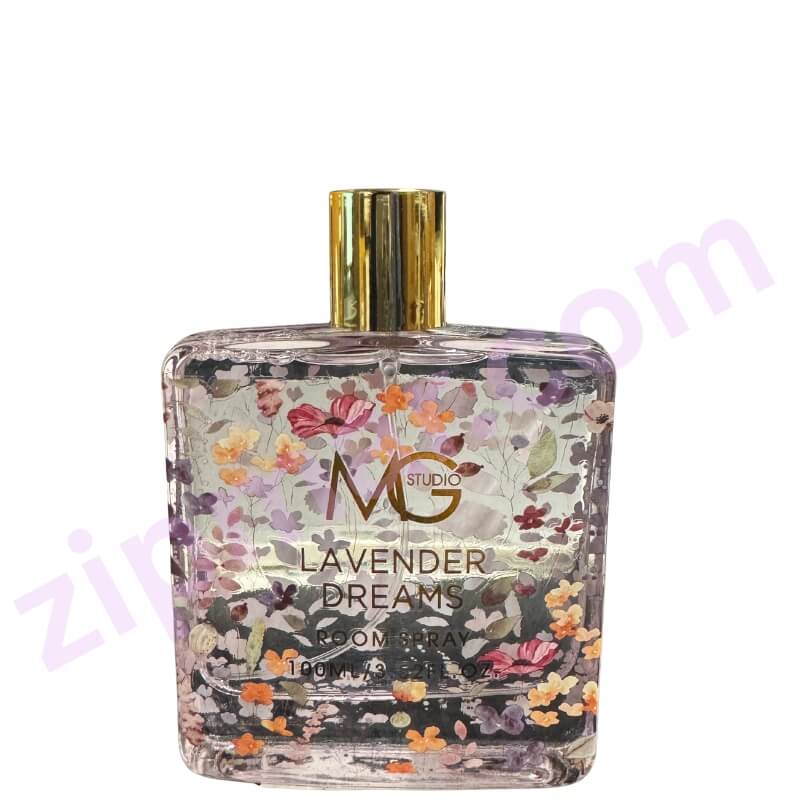 Room spray bottle with floral design and gold cap on a white background