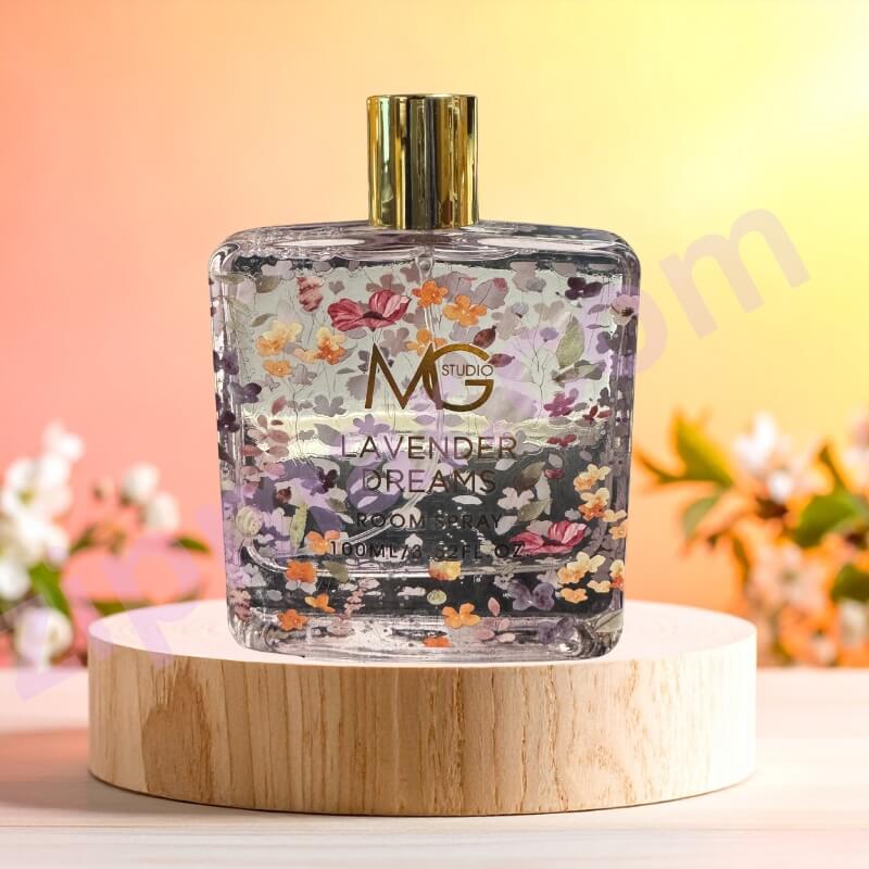 Decorative bottle with floral design on a wooden stand against a blurred floral background