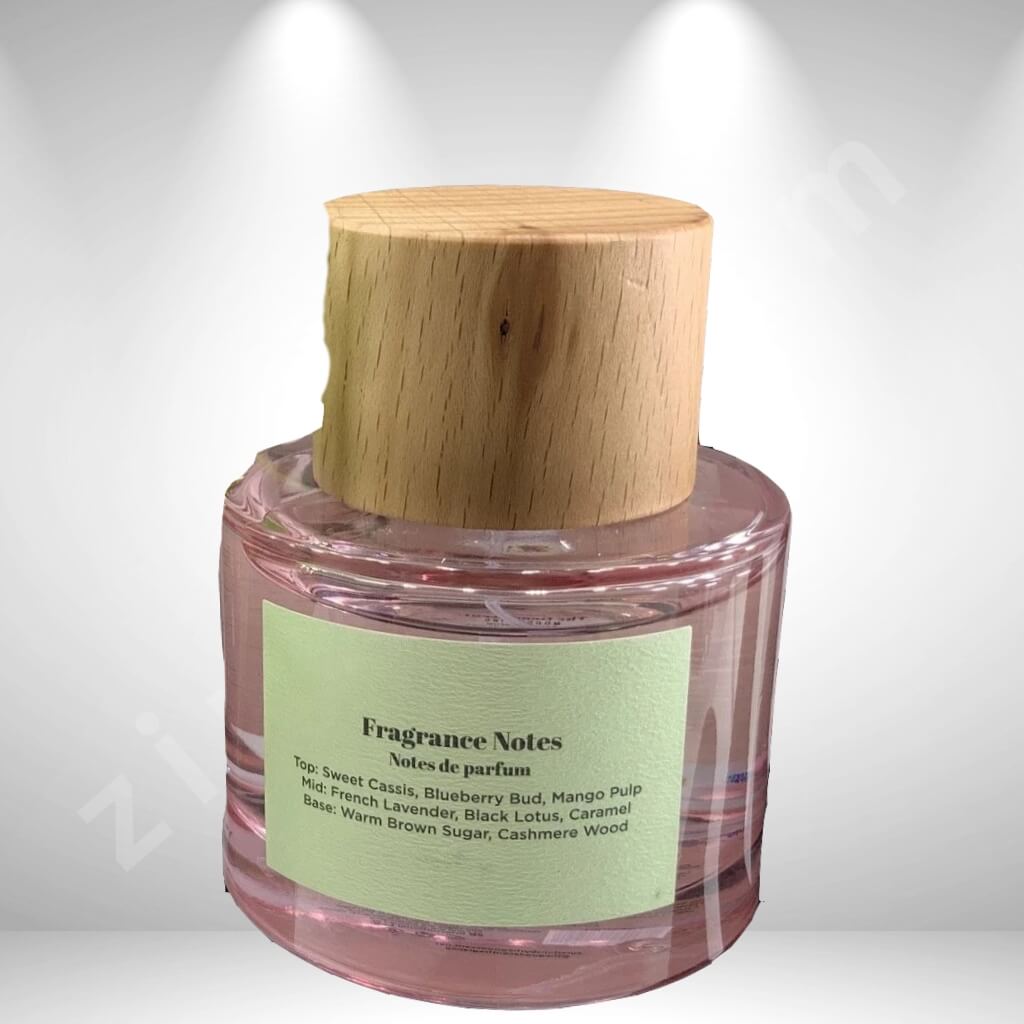 Perfume bottle with wooden cap on a light gray background