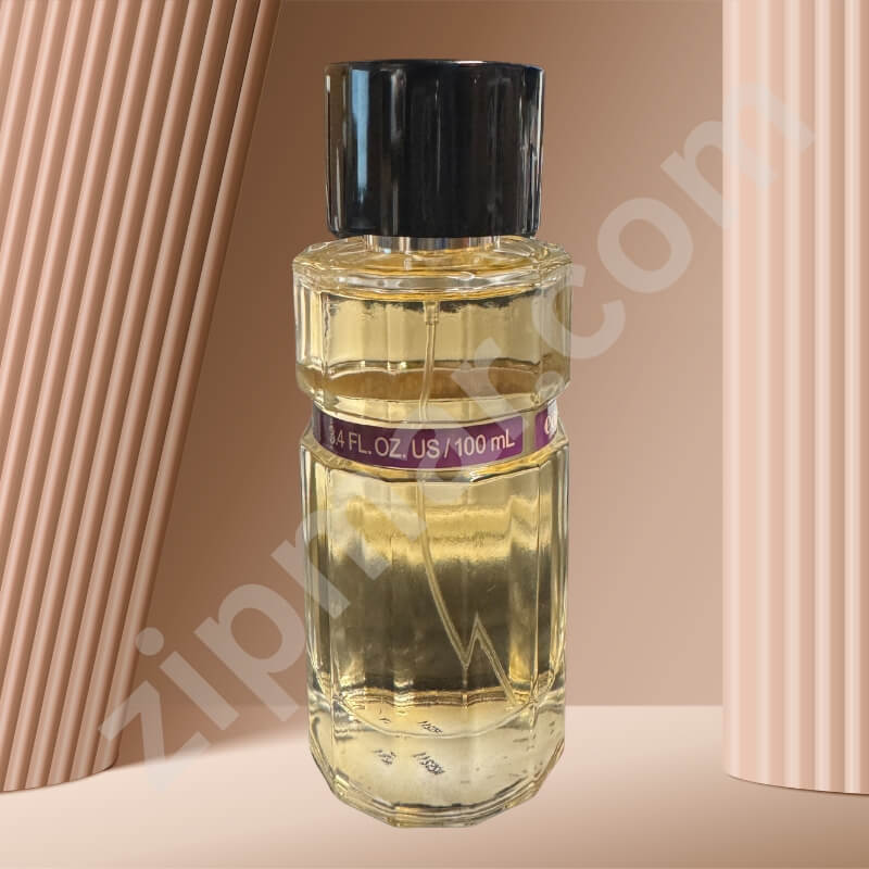 Perfume bottle with a black cap on a beige background