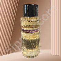 Thumbnail for Perfume bottle with a black cap on a beige background