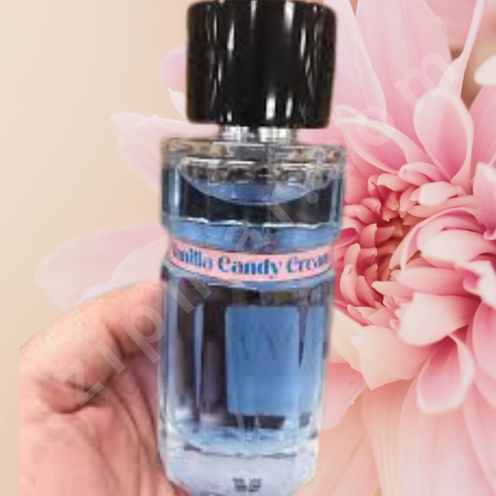 Small bottle labeled 'Vanilla Candy Cream' held in front of a pink flower.