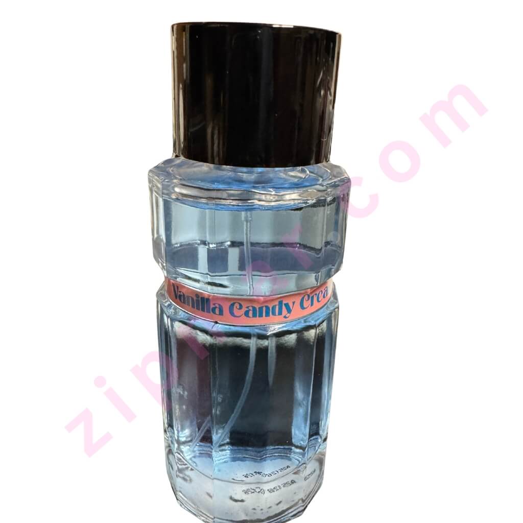 Clear glass perfume bottle with black cap on a white background