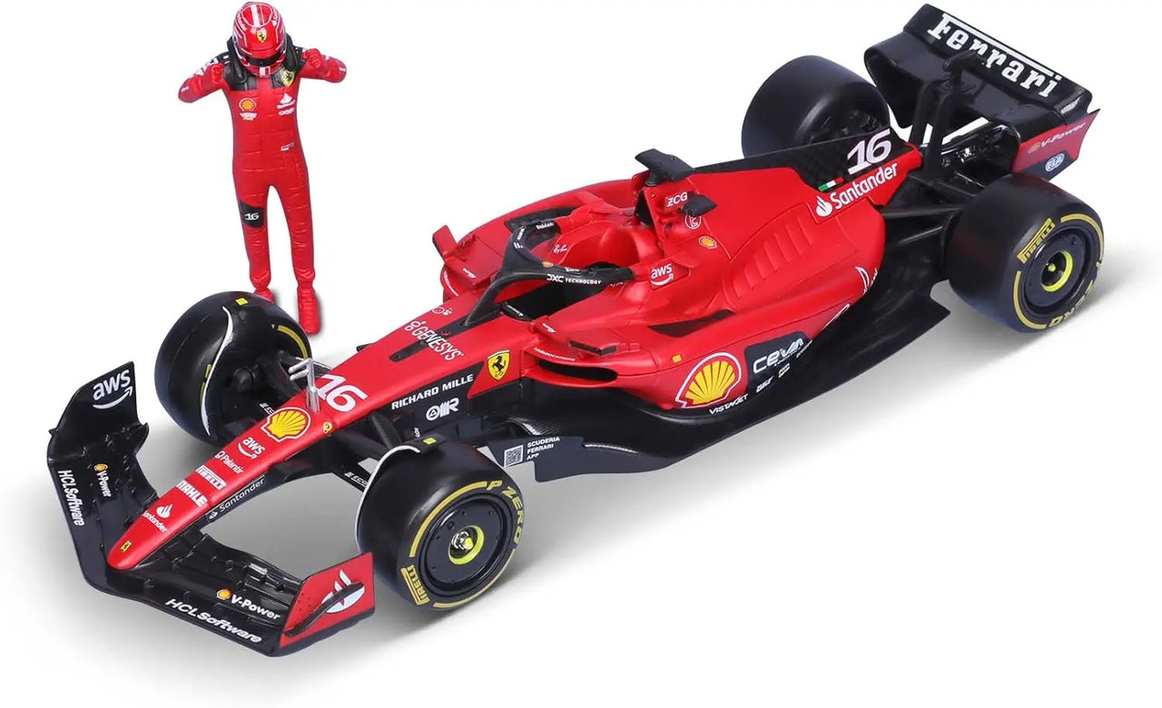 Bburago 1:24 scale diecast model of the Ferrari SF23 F1 car with an articulated pilot figurine on a white background.