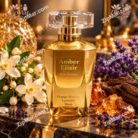 Thumbnail for Bellevue Parfums Amber Elixir Pour Femme Eau de Parfum 3.4 oz gold bottle displayed with orange blossoms, lavender, and amber stones