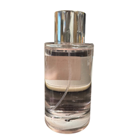Thumbnail for Rear view of the clear smoke-tinted glass bottle for Bergamot Infusion showing the internal spray tube.