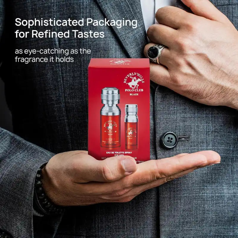 A stylish man in a tan plaid blazer posing with the Beverly Hills Polo Club Blaze gift set representing enduring charm.