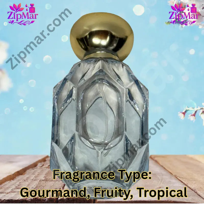 Faceted glass perfume bottle with gold cap, side view without front label