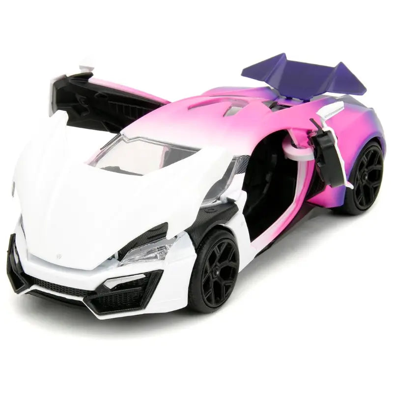 Side profile of the Jada 1:24 scale Camaro showing off-road tires, lift kit, and Brawla City door graphics.