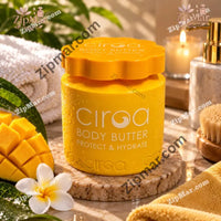 Thumbnail for Ciroa Body Butter Protect and Hydrate yellow jar with scalloped orange lid beside fresh mango and a frangipani flower