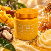 Thumbnail for Ciroa Body Butter jar with scalloped lid surrounded by mango, shea nuts, honeycomb and creamy swirls
