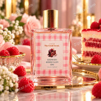 Thumbnail for Curations By The Good Scent Raspberry Mirror Glaze Cake Eau de Parfum 3.4 fl oz bottle displayed on a gold tray with fresh raspberries