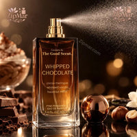 Thumbnail for Curations By The Good Scent Whipped Chocolate Eau De Parfum spraying mist surrounded by chocolate blocks and hazelnuts