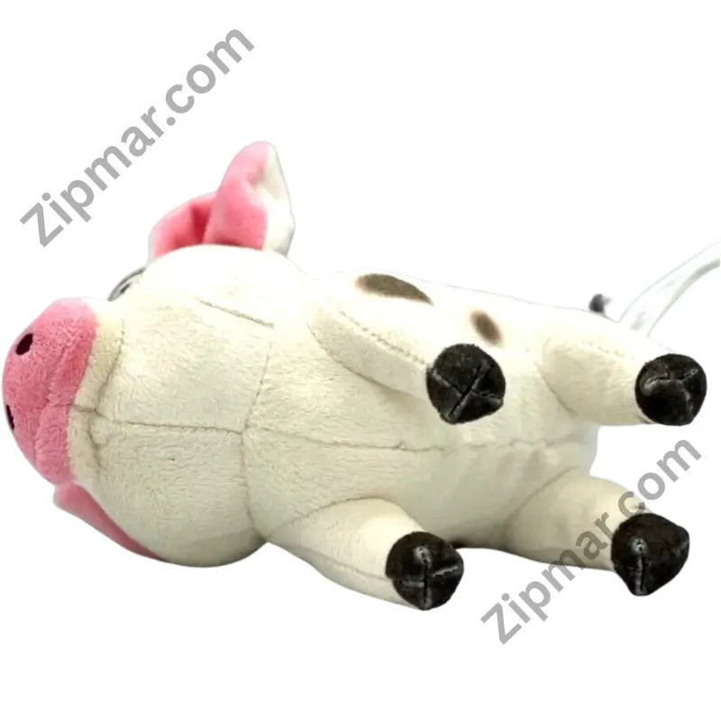 Disney Princess Pua plush from Moana lying on its side showing dark paws and pink snout”