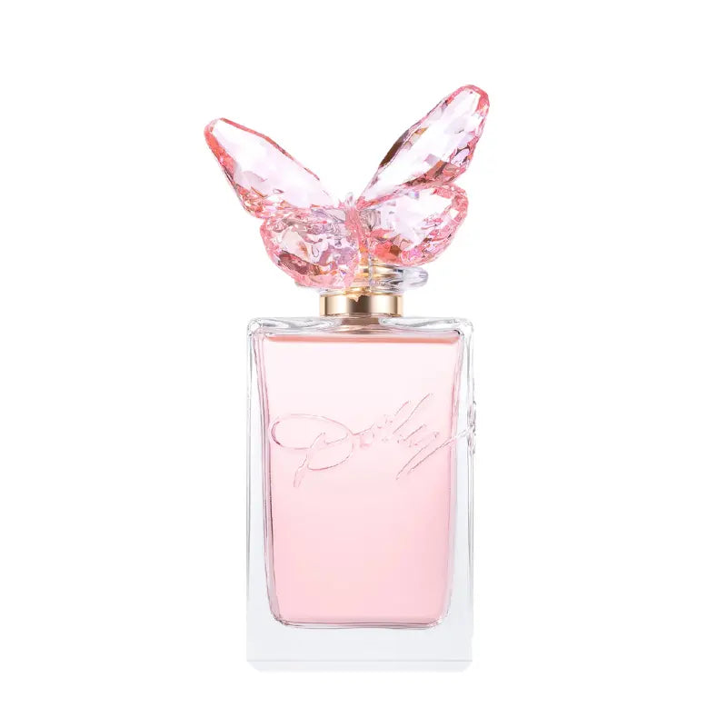 Dolly Parton Scent from Above Eau de Toilette clear glass perfume bottle with light pink liquid and distinctive crystal butterfly cap.