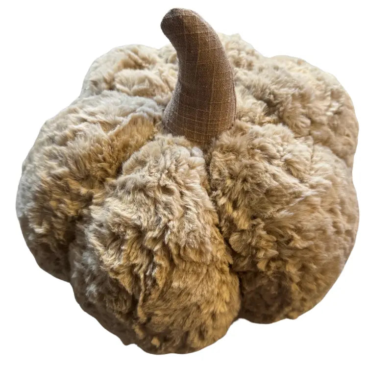 Soft tan faux fur pumpkin throw pillow angled side view