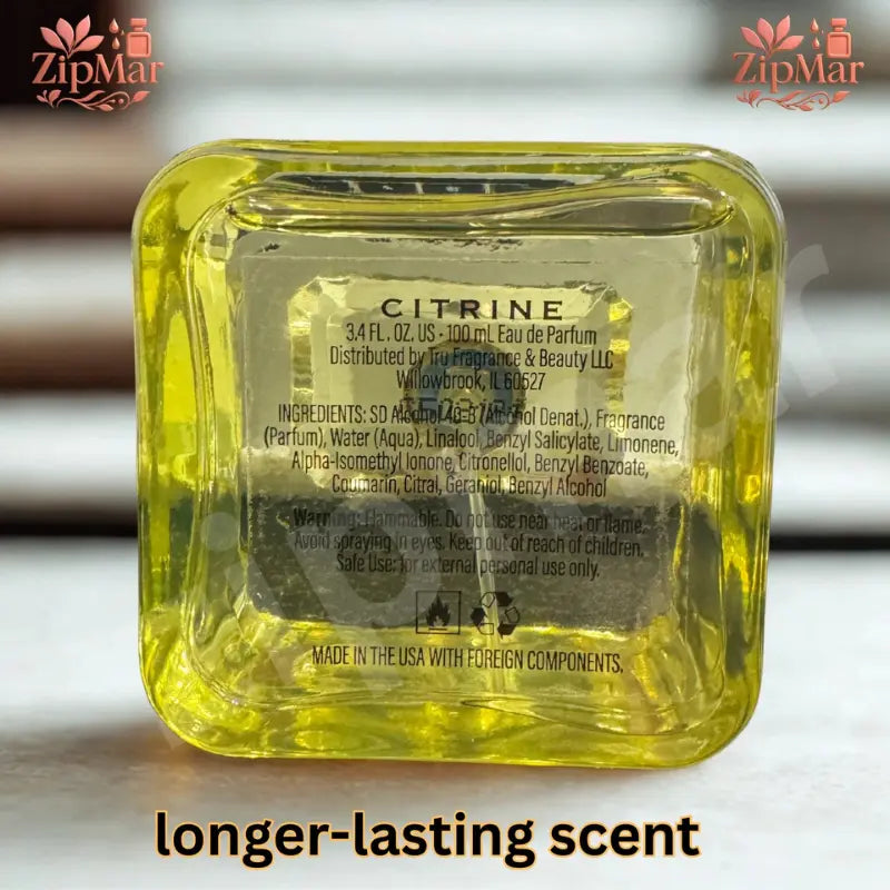 Bottom of Element Edition X Citrine Eau de Parfum bottle with 3.4 fl oz 100 mL label, Tru Fragrance and Beauty address and ingredients