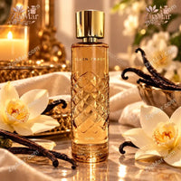 Thumbnail for Ellen Tracy Vanilla Eau de Parfum 3.4 fl oz 100 mL quilted glass bottle with gold cap beside vanilla beans