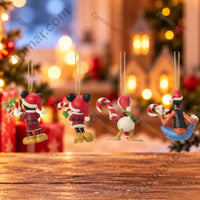 Thumbnail for Enesco Disney Traditions Jim Shore Mickey and Friends Holiday Ornament Set of 4 — back view of all four ornaments with Christmas bokeh background
