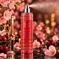 Thumbnail for English Laundry English Cherry Blossom Fine Fragrance Body Mist 8 fl oz red bottle spraying with cherry blossoms and gold bokeh