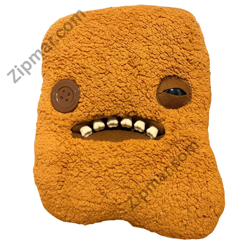 Fuggler Bigg Nuggets plush front with one button eye, one sleepy eye and crooked teeth”